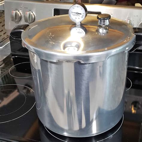 pressure cooker on glass top stove